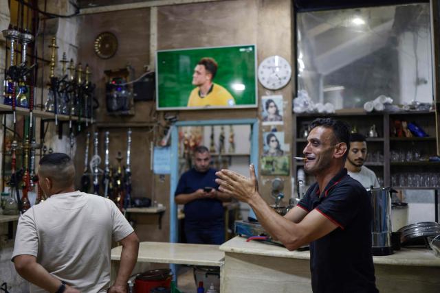 Palestinian football fans react to Egypt winning the 2026 World Cup round of 32 football match between Australia and Egypt, in Nablus, Palestine, on July 4, 2026. (Photo by Zain JAAFAR / AFP)