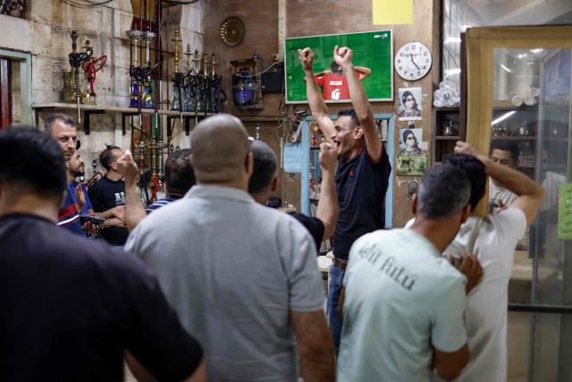 Palestinian football fans react to Egypt winning the 2026 World Cup round of 32 football match between Australia and Egypt, in Nablus, Palestine, on July 4, 2026. (Photo by Zain JAAFAR / AFP)