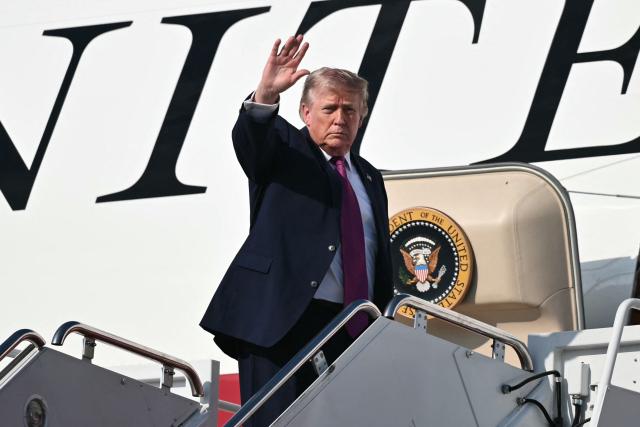 US President Donald Trump waves as he boards Air Force One before departing Joint Base Andrews, Maryland, on July 3, 2026. Trump is heading to South Dakota where he will deliver remarks at Mt. Rushmore. (Photo by Mandel NGAN / AFP)