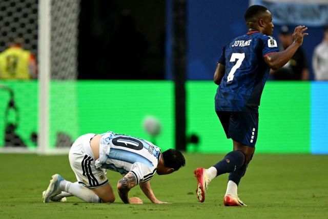 Argentina's forward #10 Lionel Messi falls next to Cape Verde's forward #07 Jovane Cabral during the 2026 World Cup round of 32 football match between Argentina and Cape Verde at the Miami Stadium in Miami Gardens on July 3, 2026.  (Photo by CHANDAN KHANNA / AFP)