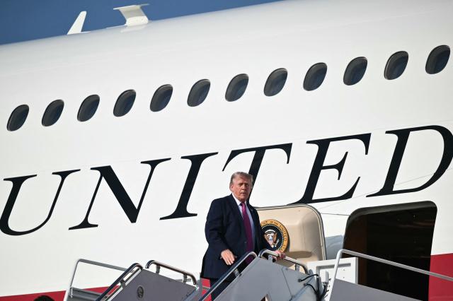US President Donald Trump boards Air Force One before departing Joint Base Andrews, Maryland, on July 3, 2026. Trump is heading to South Dakota where he will deliver remarks at Mt. Rushmore. (Photo by Mandel NGAN / AFP)