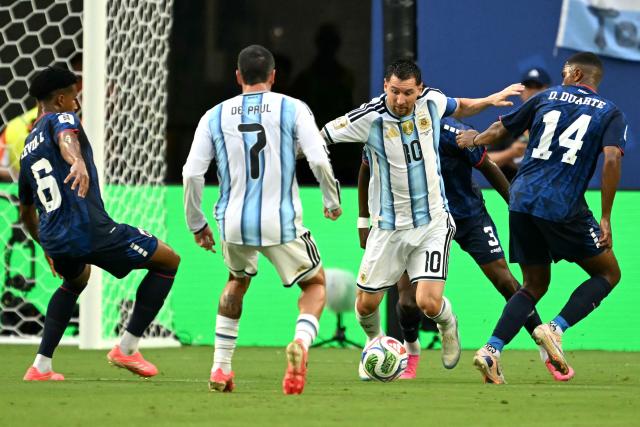 Cape Verde's midfielder #06 Kevin Pina, Argentina's forward #10 Lionel Messi and Cape Verde's midfielder #14 Deroy Duarte fight for the ball during the 2026 World Cup round of 32 football match between Argentina and Cape Verde at the Miami Stadium in Miami Gardens on July 3, 2026.  (Photo by CHANDAN KHANNA / AFP)