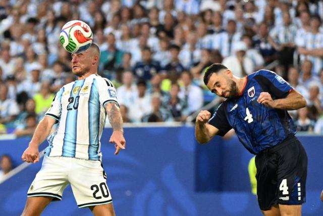 Argentina's midfielder #20 Alexis Mac Allister and Cape Verde's defender #04 Pico Lopes fight for the ball during the 2026 World Cup round of 32 football match between Argentina and Cape Verde at the Miami Stadium in Miami Gardens on July 3, 2026.  (Photo by ROBERTO SCHMIDT / AFP)