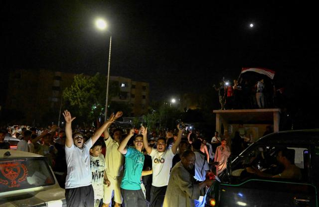 Egyptian fans celebrate their team's victory in the 2026 World Cup Round of 32 football match against Australia in Al-Shorouk City, east of Cairo, on July 4, 2026. (Photo by Khaled DESOUKI / AFP)