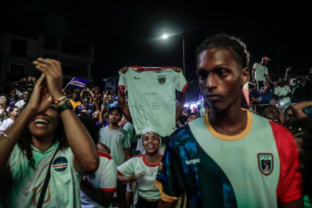 Supporters of Cape Verde’s national football team celebrate Cape Verde’s second goal during the 2026 World Cup round of 32 football match between Argentina and Cape Verde in Praia on July 3, 2026. (Photo by Jose Correia / AFP)