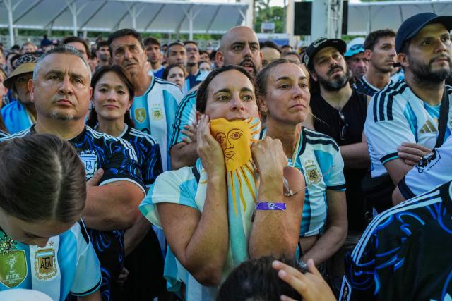 Argentina fans react as they watch the 2026 World Cup Round of 32 football match between Argentina and Cape Verde in Miami Beach, Florida, on July 3, 2026. (Photo by Giorgio VIERA / AFP)