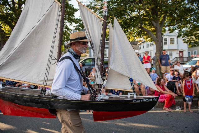 A man dressed as a schooner ship marches along the route during the Gloucester Fishtown Horribles Parade in Gloucester, Massachusetts on July 3, 2026. The parade is part of the city’s July 4th celebrations. (Photo by Joseph PREZIOSO / AFP)