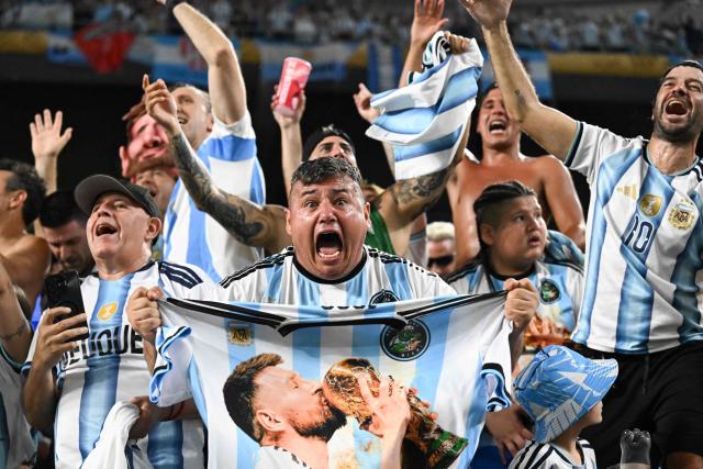 Argentine fans celebrate at the end of the 2026 World Cup round of 32 football match between Argentina and Cape Verde at the Miami Stadium in Miami Gardens on July 3, 2026.  (Photo by ROBERTO SCHMIDT / AFP)