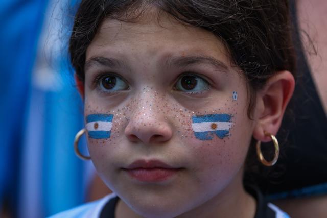 A young Argentina fan watches the 2026 World Cup Round of 32 football match between Argentina and Cape Verde in Miami Beach, Florida, on July 3, 2026. (Photo by Giorgio Viera / AFP)