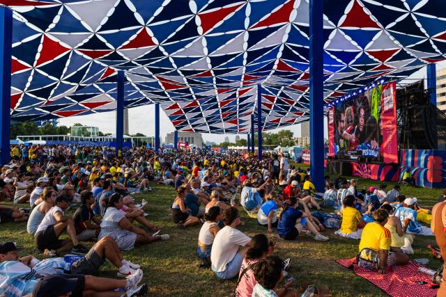 Fans relax at the FIFA Fan Festival as they wait for the WC 2026 Round of 32 match between Colombia and Ghana in Kansas City, Missouri on July 3, 2026. (Photo by Austin Johnson / AFP)