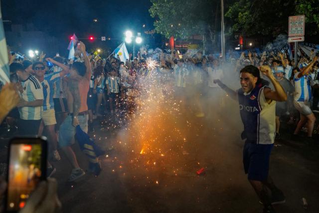Argentina fans celebrate their team's victory in the 2026 World Cup Round of 32 football match against Cape Verde in Miami Beach, Florida, on July 3, 2026. (Photo by Giorgio VIERA / AFP)