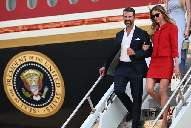Donald Trump Jr. with his wife Bettina Anderson step off Air Force One upon arrival at Ellesworth Air Force Base in South Dakota on July 3, 2026. Trump is heading to South Dakota where he will deliver remarks at Mt. Rushmore. (Photo by Mandel NGAN / AFP)