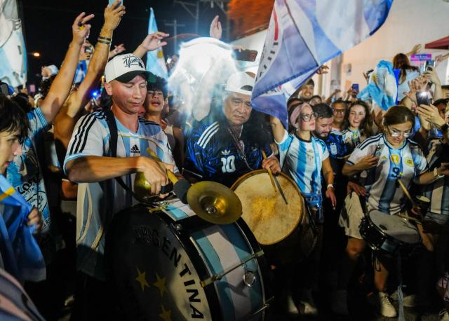 Argentina fans celebrate their team's victory in the 2026 World Cup Round of 32 football match against Cape Verde in Miami Beach, Florida, on July 3, 2026. (Photo by Giorgio VIERA / AFP)
