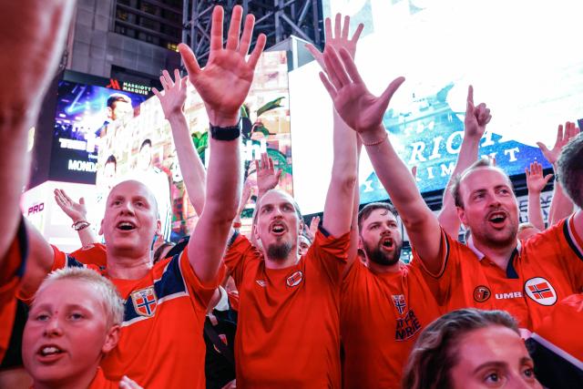 Norway fans gather in Times Square two days before their team’s World Cup Round of 16 match against Brazil in New York on July 3, 2026. (Photo by kena betancur / AFP)