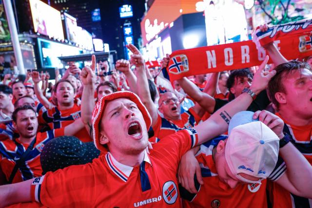 Norway fans gather in Times Square two days before their team’s World Cup Round of 16 match against Brazil in New York on July 3, 2026. (Photo by kena betancur / AFP)
