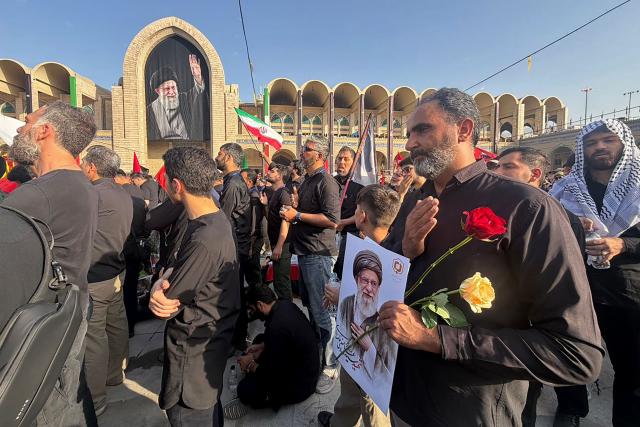Mourners gather at the Grand Mosalla to pay their final respects to Iran's slain supreme leader Ayatollah Ali Khamenei at the start of his funeral ceremonies in Tehran on July 4, 2026. Iran officially began on July 4 morning six days of public funeral ceremonies for late supreme leader Ayatollah Ali Khamenei, state television reported, with processions due to continue in Iraq before his burial. (Photo by Atta KENARE / AFP) / 