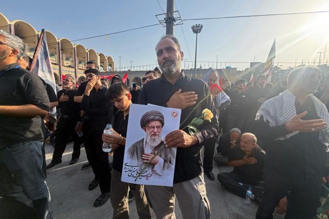Mourners gather at the Grand Mosalla to pay their final respects to Iran's slain supreme leader Ayatollah Ali Khamenei at the start of his funeral ceremonies in Tehran on July 4, 2026. Iran officially began on July 4 morning six days of public funeral ceremonies for late supreme leader Ayatollah Ali Khamenei, state television reported, with processions due to continue in Iraq before his burial. (Photo by Atta KENARE / AFP) / 