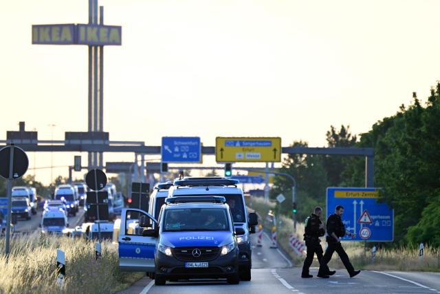 Police block the access to the Messe Erfurt fairground in Erfurt, eastern Germany on July 4, 2026, where the party congress of far-right Alternative for Germany (AfD) will be held from July 4-5. German police are bracing to guard an annual congress of the far-right AfD party this weekend against tens of thousands of antifascist demonstrators who are determined to shut it down. The standoff in the city of Erfurt, Thuringia state, comes as the opposition Alternative for Germany party is soaring in national opinion polls ahead of all other parties. (Photo by John MACDOUGALL / AFP)