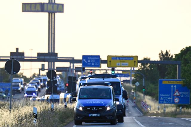 Police block the access to the Messe Erfurt fairground in Erfurt, eastern Germany on July 4, 2026, where the party congress of far-right Alternative for Germany (AfD) will be held from July 4-5. German police are bracing to guard an annual congress of the far-right AfD party this weekend against tens of thousands of antifascist demonstrators who are determined to shut it down. The standoff in the city of Erfurt, Thuringia state, comes as the opposition Alternative for Germany party is soaring in national opinion polls ahead of all other parties. (Photo by John MACDOUGALL / AFP)