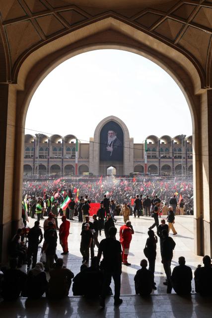 Mourners gather at the Grand Mosalla to pay their final respects to Iran's slain supreme leader Ayatollah Ali Khamenei at the start of his funeral ceremonies in Tehran on July 4, 2026. Funeral ceremonies for Iran's supreme leader Ali Khamenei officially began on July 4, state television reported, an event drawing thousands and intended to serve as a show of strength to the Islamic republic's foes. (Photo by ATTA KENARE / AFP) / 