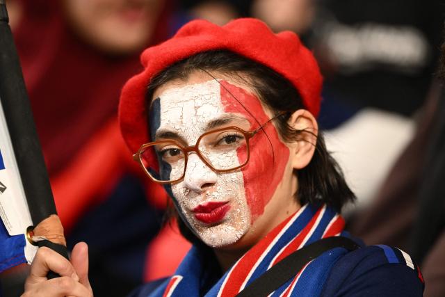 A French fan shows her support prior to the rugby Nations Championship match between New Zealand and France at One New Zealand Stadium in Christchurch on July 4, 2026. (Photo by Sanka VIDANAGAMA / AFP)