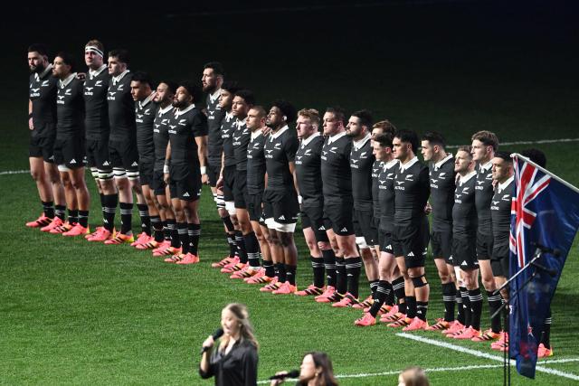 New Zealand players observe their national anthem before the start of the rugby Nations Championship match between New Zealand and France at One New Zealand Stadium in Christchurch on July 4, 2026. (Photo by Sanka VIDANAGAMA / AFP)