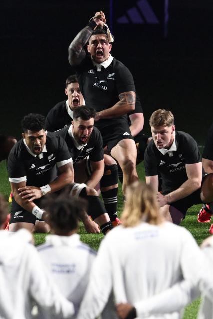 New Zealand Codie Taylor (C) and his teammates perform a haka in front of French players before the start of the rugby Nations Championship match between New Zealand and France at One New Zealand Stadium in Christchurch on July 4, 2026. (Photo by Sanka VIDANAGAMA / AFP)