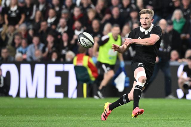 New Zealand's Damian McKenzie passes the ball during the rugby Nations Championship match between New Zealand and France at One New Zealand Stadium in Christchurch on July 4, 2026. (Photo by Sanka VIDANAGAMA / AFP)