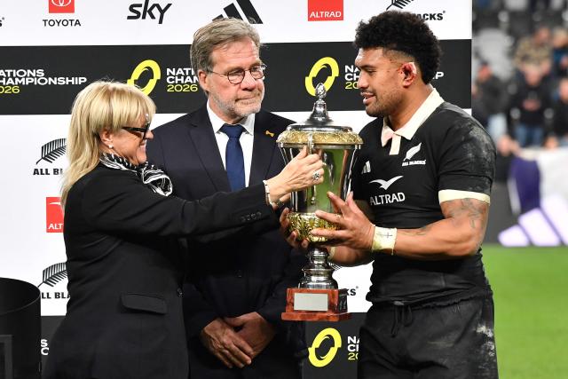 New Zealand's Ardie Savea (R) is presented the Dave Gallaher Trophy after the rugby Nations Championship match between New Zealand and France at One New Zealand Stadium in Christchurch on July 4, 2026. (Photo by Sanka Vidanagama / AFP)