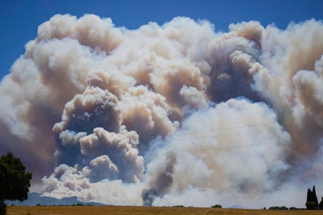 A photograph taken on July 3, 2026 shows smoke rising from a fire burning near La Bisbal de l’Emporda, northeastern Spain on July 3, 2026. (Photo by AFP)