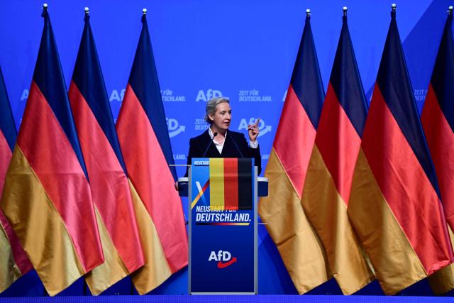 Co-leader of the far-right Alternative for Germany (AfD) party Alice Weidel addresses delegates at the party congress of far-right Alternative for Germany (AfD) at the Messe Erfurt fairground in Erfurt, eastern Germany on July 4, 2026. About 20,000 people flocked to Erfurt, in Thuringia state, according to police, to protest against the Alternative for Germany (AfD) party that tops national opinion polls. (Photo by John MACDOUGALL / AFP)