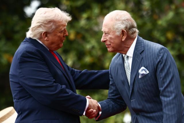 (FILES) US President Donald Trump (L) and Britain's King Charles III shake hands during an arrival ceremony on the South Lawn of the White House in Washington, DC, on April 28, 2026. Britain's King Charles III on July 4, 2026 said the US and UK would continue to defend "shared values", in a message to US President Donald Trump and the American people on the country's 250th independence anniversary. (Photo by Henry NICHOLLS / AFP)