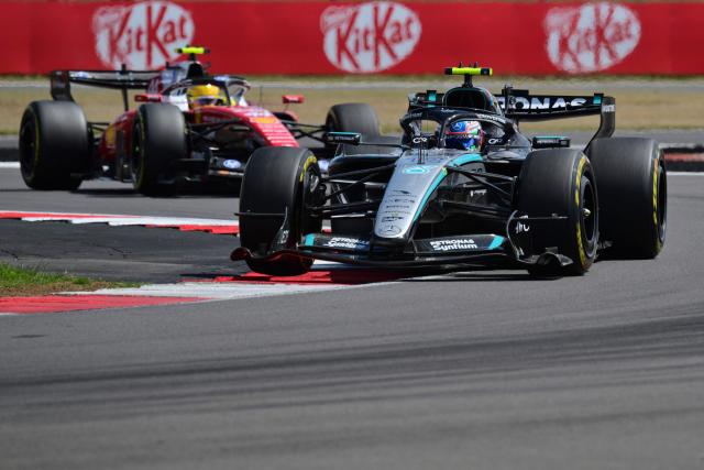 Mercedes' Italian driver Kimi Antonelli leads Ferrari's British driver Lewis Hamilton during the sprint race ahead of the Formula One British Grand Prix at the Silverstone motor racing circuit in Silverstone, central England, on July 4, 2026. (Photo by Andrej ISAKOVIC / AFP)
