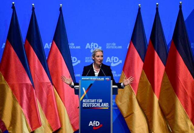 Co-leader of the far-right Alternative for Germany (AfD) party Alice Weidel gestures at the end of her speech at the party congress of far-right Alternative for Germany (AfD) at the Messe Erfurt fairground in Erfurt, eastern Germany on July 4, 2026. About 20,000 people flocked to Erfurt, in Thuringia state, according to police, to protest against the Alternative for Germany (AfD) party that tops national opinion polls. (Photo by John MACDOUGALL / AFP)