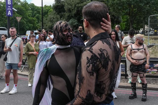 Participants prepare to take part in the annual Pride Parade, in celebration and support of the lesbian, gay, bisexual and transgender (LGBT+) community, in London on July 4, 2026. (Photo by CARLOS JASSO / AFP)