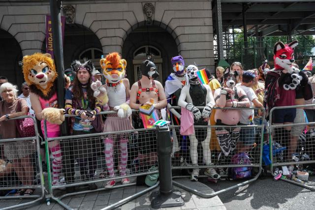 People in costume line the route waiting for the annual Pride Parade, in celebration and support of the lesbian, gay, bisexual and transgender (LGBT+) community, in London on July 4, 2026. (Photo by CARLOS JASSO / AFP)