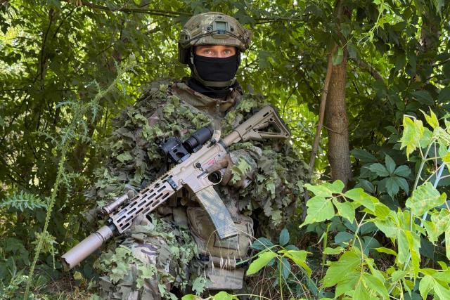 A French volunteer member from the Revanche Tactical Group, which operates under the International Legion of the Defence Intelligence of Ukraine, poses for a photograph as he takes part in a military training at an undisclosed location, in the Zaporizhzhia region, on July 3, 2026, amid the Russian invasion of Ukraine. (Photo by Darya NAZAROVA / AFP)
