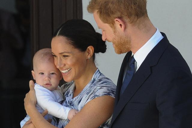 (FILES) Britain's Duke and Duchess of Sussex, Prince Harry and his wife Meghan hold their baby son Archie as they meet with Archbishop Desmond Tutu and his wife (unseen) at the Tutu Legacy Foundation  in Cape Town on September 25, 2019. Britain' Prince Harry will stay in London without his wife Meghan and their two children while visiting the UK in July, a source close to him told AFP on July 4, 2026. (Photo by HENK KRUGER / POOL / AFP)