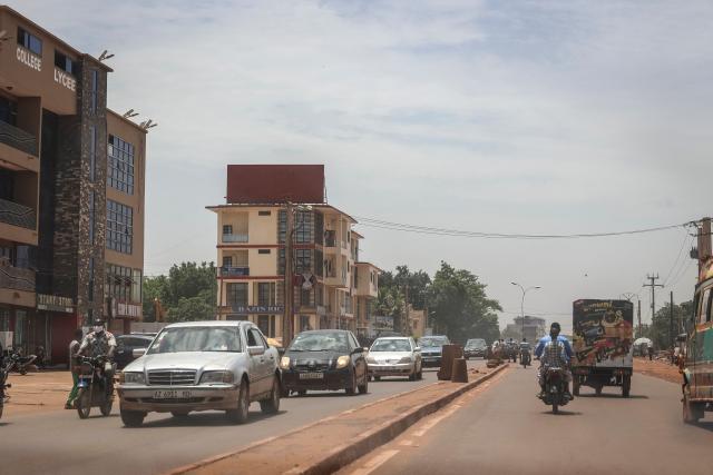 A general view shows traffic moving along a main road in Bamako on July 4, 2026. Jihadists and their separatist Tuareg allies hit Mali with fresh coordinated attacks on July 4, 2026, striking multiple towns and a prison just months after hobbling the country's military junta with a similar wave of assaults. (Photo by AFP)