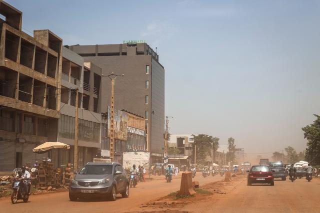 A general view shows traffic moving along a main road in Bamako on July 4, 2026. Jihadists and their separatist Tuareg allies hit Mali with fresh coordinated attacks on July 4, 2026, striking multiple towns and a prison just months after hobbling the country's military junta with a similar wave of assaults. (Photo by AFP)