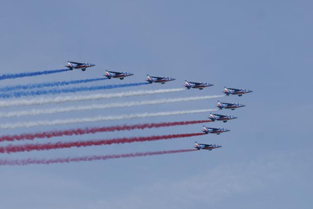 US military planes fly over during Sail 4th 250 in New York, on July 4, 2026. Millions of Americans celebrated the country's 250th birthday on Saturday -- a landmark celebration that comes at a time of deep political division, with a president determined to put his stamp on the festivities. Washington's traditional fireworks display on the National Mall -- lined with monuments celebrating the nation's Founding Fathers -- has been super-sized, and is being touted as the biggest ever. (Photo by TIMOTHY A. CLARY / AFP)