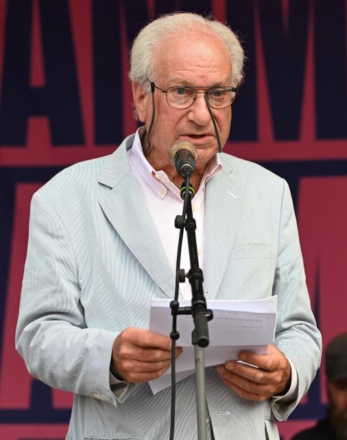 Descendants of German motorbike manufacturer Simson, Dennis Baum speaks during a rally by the German union association (DGB) in Erfurt, eastern Germany on July 4, 2026, to protest against the party congress of far-right Alternative for Germany (AfD). The Jewish descendants of German motorbike manufacturer Simson that was forced by the Nazis to be relinquished speak against the appropriation of the vehicle by far-right populists. (Photo by RALF HIRSCHBERGER / AFP)
