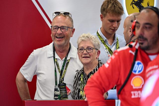 Carmen Larbalestier (2nd L), the mother of Ferrari's British driver Lewis Hamilton, looks out from the garage ahead of the qualifying session ahead of the Formula One British Grand Prix at the Silverstone motor racing circuit in Silverstone, central England, on July 4, 2026. (Photo by PETER POWELL / POOL / AFP)