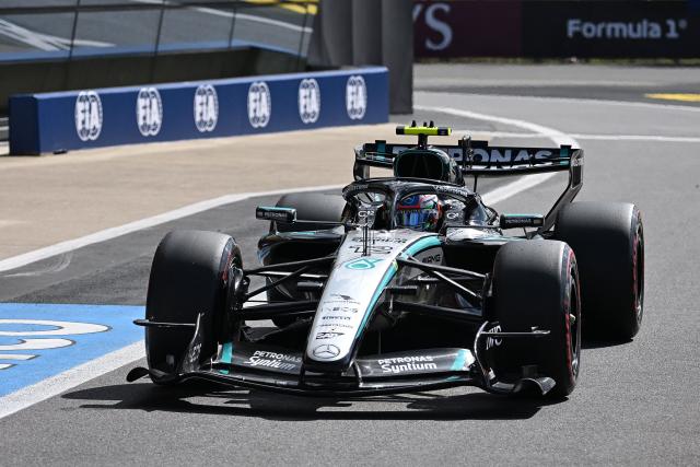 Mercedes' Italian driver Kimi Antonelli drives down pit lane during the qualifying session ahead of the Formula One British Grand Prix at the Silverstone motor racing circuit in Silverstone, central England, on July 4, 2026. (Photo by PETER POWELL / POOL / AFP)