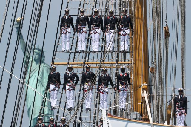 Italys tall ship Amerigo Vespucci passes the Statue of Liberty during Sail 4th 250 in New York, on July 4, 2026. Millions of Americans celebrated the country's 250th birthday on Saturday -- a landmark celebration that comes at a time of deep political division, with a president determined to put his stamp on the festivities. Washington's traditional fireworks display on the National Mall -- lined with monuments celebrating the nation's Founding Fathers -- has been super-sized, and is being touted as the biggest ever. (Photo by TIMOTHY A. CLARY / AFP)