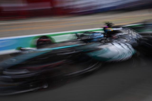 Mercedes' British driver George Russell prepares to take part in the qualifying session ahead of the Formula One British Grand Prix at the Silverstone motor racing circuit in Silverstone, central England, on July 4, 2026. (Photo by PETER POWELL / POOL / AFP)