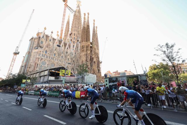 Groupama-FDJ United team riders cycle past the Sagrada Familia Basilica during the 1st stage of the 113th edition of the Tour de France cycling race, a 19,6 km team time trial stage in and around Barcelona in northeastern Spain, on July 4, 2026. (Photo by Josep LAGO / AFP)