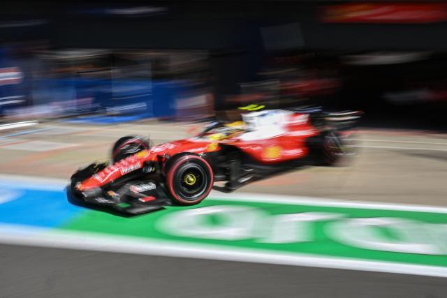 Ferrari's British driver Lewis Hamilton drives out of the garage to take part in the qualifying session ahead of the Formula One British Grand Prix at the Silverstone motor racing circuit in Silverstone, central England, on July 4, 2026. (Photo by PETER POWELL / AFP)