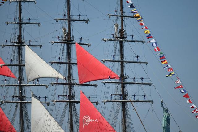 Peruvian training ship BAP Union sails past the Statue of Liberty during the Sail 4th 250 Parade of Ships in New York harbor in New York, on July 4, 2026. Millions of Americans celebrated the country's 250th birthday on Saturday -- a landmark celebration that comes at a time of deep political division, with a president determined to put his stamp on the festivities. Washington's traditional fireworks display on the National Mall -- lined with monuments celebrating the nation's Founding Fathers -- has been super-sized, and is being touted as the biggest ever. (Photo by ANGELA WEISS / AFP)