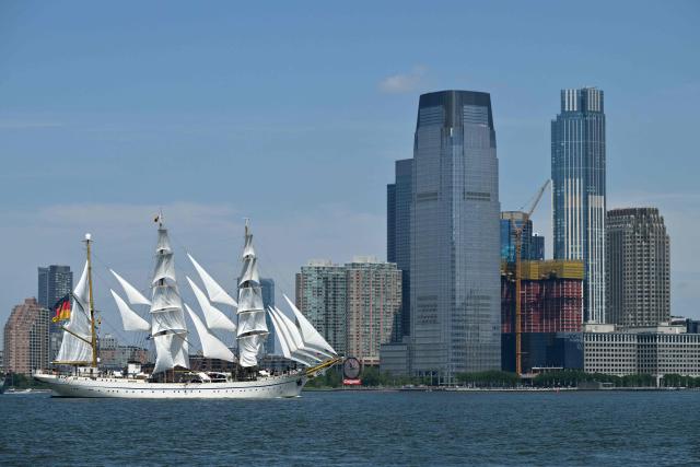 German tall ship Gorch Fock sails past during the Sail 4th 250 Parade of Ships in New York harbor in New York, on July 4, 2026. Millions of Americans celebrated the country's 250th birthday on Saturday -- a landmark celebration that comes at a time of deep political division, with a president determined to put his stamp on the festivities. Washington's traditional fireworks display on the National Mall -- lined with monuments celebrating the nation's Founding Fathers -- has been super-sized, and is being touted as the biggest ever. (Photo by ANGELA WEISS / AFP)